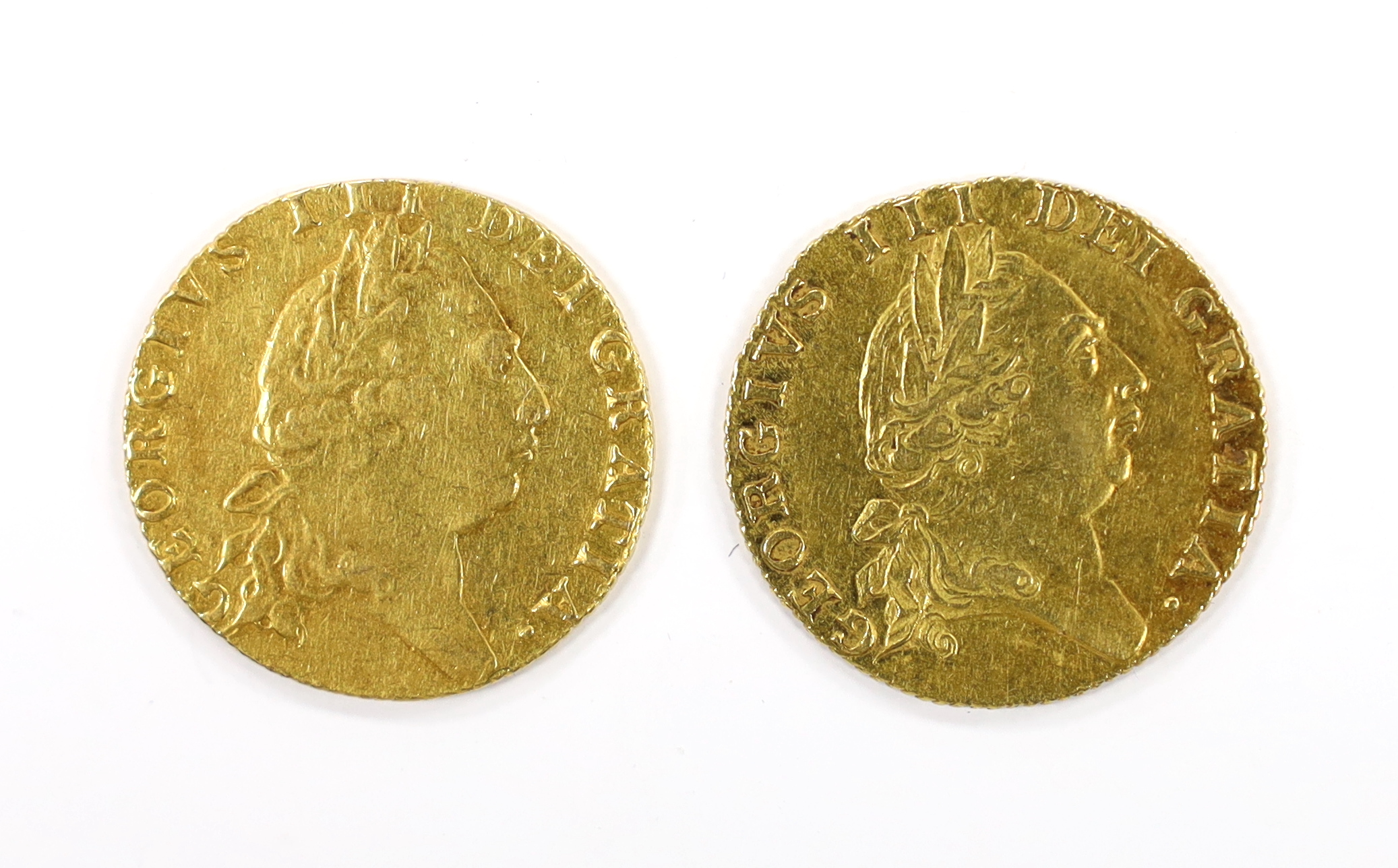 British gold coins, two George III guineas, 1788, good VF and 1793, edge wear otherwise F, both (S3729)